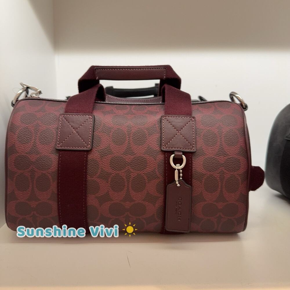 NWT Coach Explorer Duffle Bag 28 Signature Canvas CET22 SV/Black Currant